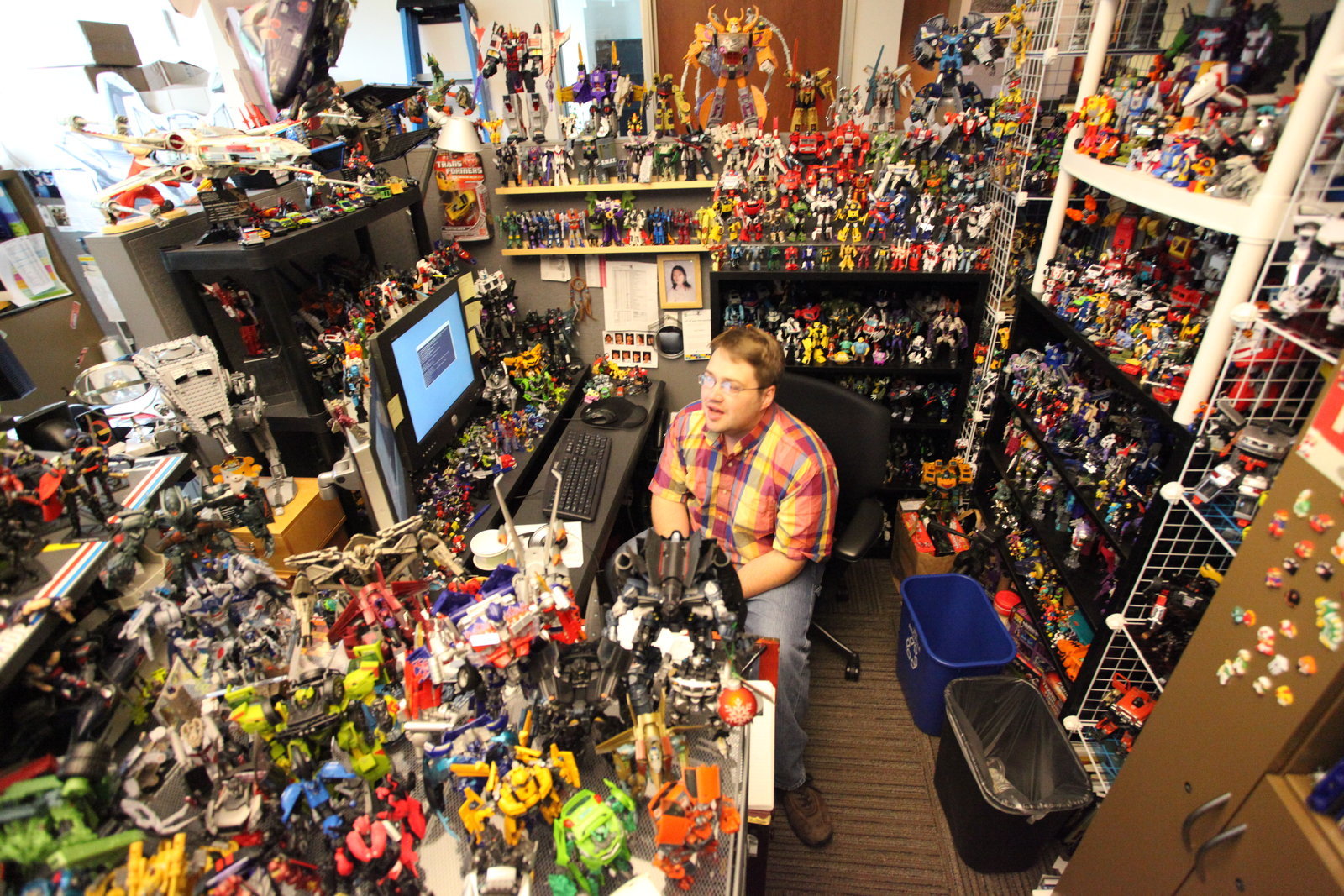 A typical Transformers collector in his happy place
